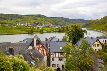 Fototapeta na wymiar Aerial view of the Moselle valley with vineyards and the villages Ellenz-Poltersdorf and Beilstein