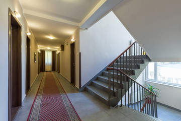 Interior of a hotel doorway with stairs