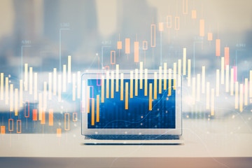 Forex graph hologram on table with computer background. Multi exposure. Concept of financial markets.