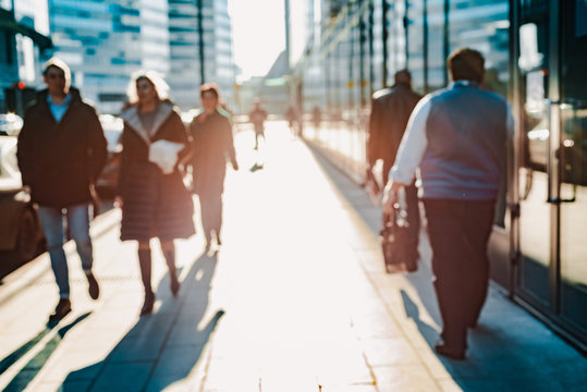 Urban Pedestrians, City Commuters. A Blurry Image Of People In The City Returning Home After Work.