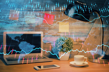 Multi exposure of graph and financial info and work space with computer background. Concept of international online trading.