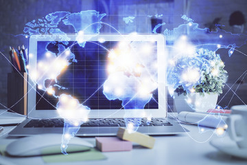 Double exposure of business theme icons and work space with computer background. Concept of success.