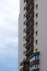 Multi-storey residential building in the city against the sky.