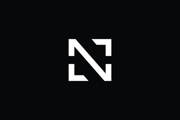 Minimal elegant monogram art logo. Outstanding professional trendy awesome artistic N initial based Alphabet icon logo. Premium Business logo White color on black background