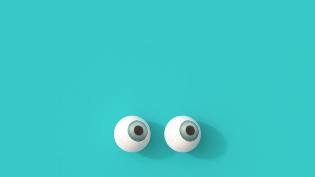 Rolling eyes on turquoise background