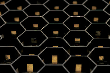 black textural background from hexagonal. Perspective view.