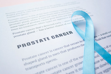 Prostate cancer quote on white paper list article with blue ribbon November Prostate Cancer...