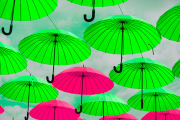 Colorful umbrellas background. Colorful umbrellas in the sky. Street decoration	