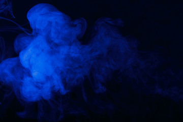 blue smoke on a black background, suitable for advertising a hookah, vape, car smoke, photo shoot or creating a different atmosphere