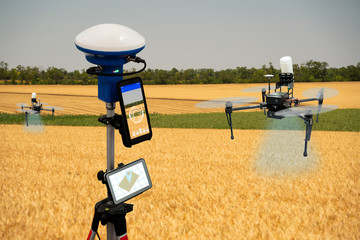 Device for measuring field area and positioning drones. Precision farming system