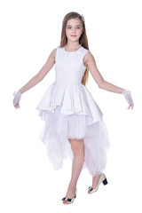 Naklejka premium Happy beautiful little girl in white dress posing isolated 