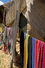 Puno Peru. Lake Titicaca. Floating village. Uros people. Reed culture. Reed houses.