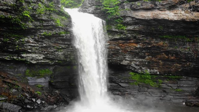 Pushing in Aerial View of the majestic Cedar Falls, location in the Petit Jean Parking, deep in the Arkansas National Park, Wide shot, slow motion