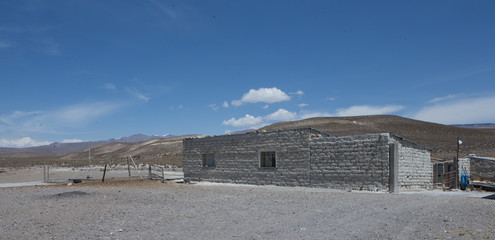 Highlands Peru Andes. Abandoned building in desert.