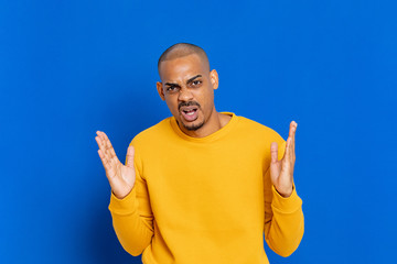 African guy with a yellow jersey