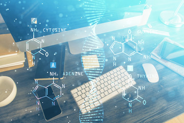Desktop computer background and DNA drawing. Double exposure. Science concept.