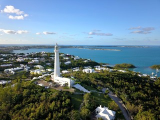 The drone aerial view of Bermuda islands and the Gibbs hill lighthouse. The Lighthouse is one of the first lighthouses in the world to be made of cast-iron. © yujie