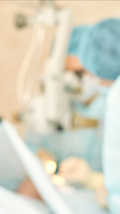 Blur vertical medical background. Operation ophthalmology concept. Hospital treatment clinic...