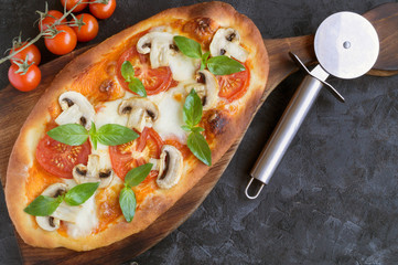  delicious pizza with mushrooms.