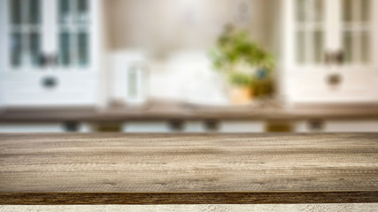 Fototapeta premium Desk of free space for your decoration and blurred kitchen interior.