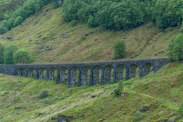 Arched stone railway bridge near Crianlarich, Scotland. Concept: Scottish railways, mysterious...