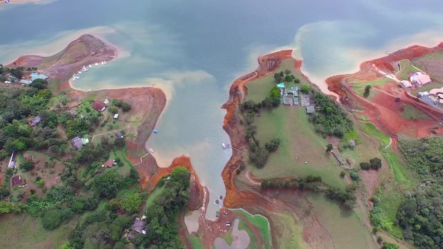 Huge Calima lake from above, aerial view to the Colombian wild nature. Travelling around South America. Drone top video 4K.