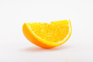 Slice of orange on a white background