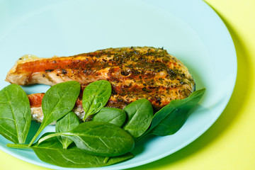 grilled salmon steaks until golden brown with spices and lemon juice