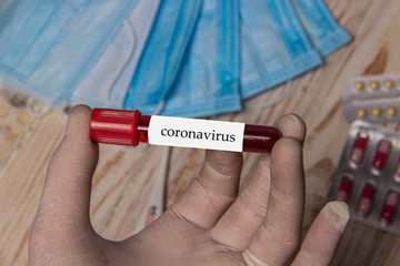 Obraz premium Blood in a test tube for coronavirus research, preventing an epidemic