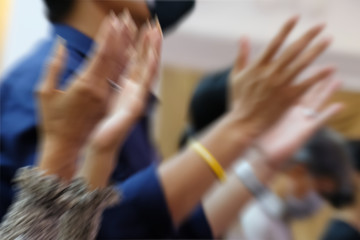 blurred, People praying and praise together at Church.	