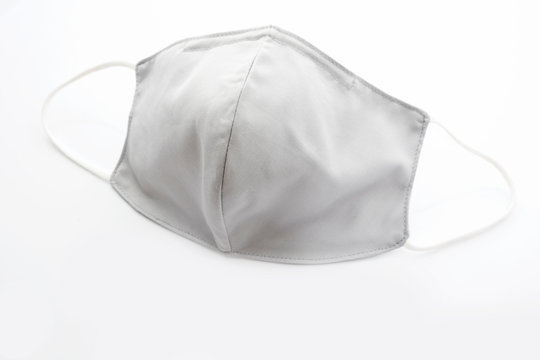 Face mask, cloth for protection against viruses and dust on a white background