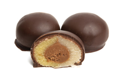 round chocolate candies with marzipan filling