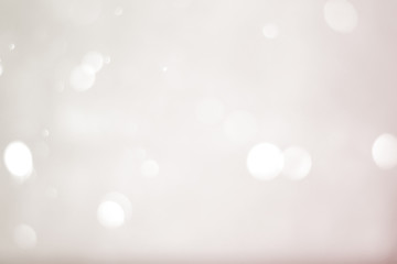 Abstract bokeh light sparkle on pink background