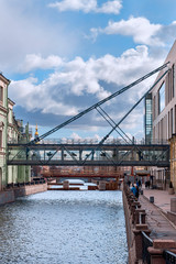 Fototapeta na wymiar suspension bridge over the canal between the new and old buildings of the opera house in St. Petersburg, Russia