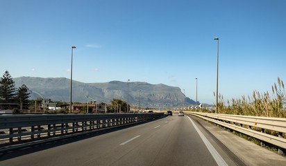 Sicilian highway - Travelling through this beautiful Southern European island. The highway is equipped with crash barriers.