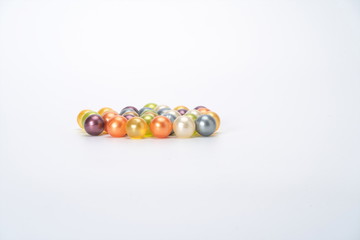 The colorful fragrant beads with all kinds of fragrance in the white background can make the air fresh and let the opposite sex like you, so that you can put it in the car or the room