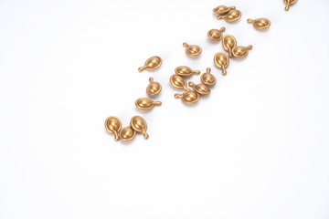 Top macro view of fragrance beads, translucent rose gold fragrance beads and freshener fragrance beads