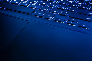 laptop keyboard bottom background dark blue illumination light modern technology object