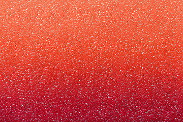 Fototapeta premium Texture of old dark red paper background with coral gradient, closeup. Structure carmine craft cardboard.