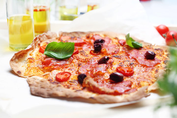 Thin crust pizza. A plate with an appetizing dish. Application suggestion. Culinary photography,...