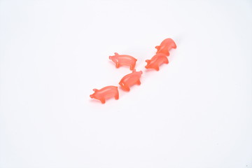 Colorful rabbits, kangaroos, pigs, and animal-shaped aromatic capsules are on a white background