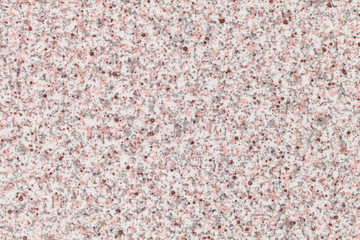 Grainy white background with pink and gray spots. Texture backdrop with small crumb pattern. Stone surface.
