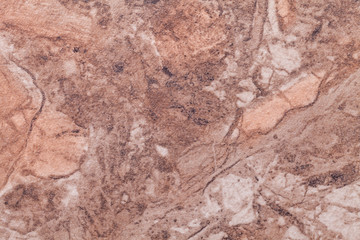Texture of dark brown marble with pattern, macro background. Umber stone backdrop.