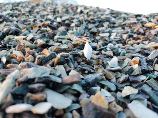 Stack of broken stones.Big pile of broken Rocks and Boulders.Pile stack of huge natural granite stone.Stack of Crushed Stones in quarry. Colorful pebble.