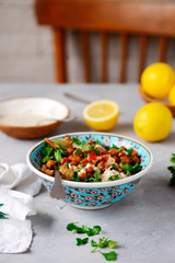 ROASTED CAULIFLOWER SALAD WITH LEMON TAHINI DRESSING..life style .selective focus