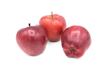 Ripe red organic apples isolated on a white background