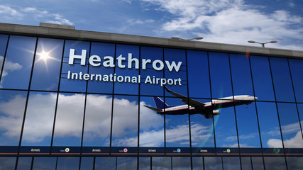 Airplane landing at London Heathrow mirrored in terminal - obrazy, fototapety, plakaty