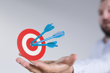 dart target arrow hitting on bullseye which is the ultimate goal that everyone wants.