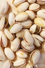 food background with roasted pistachio in details