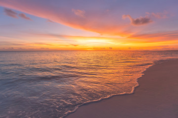 Closeup of sand on beach and blue summer sky. Panoramic beach landscape. Empty tropical beach and...